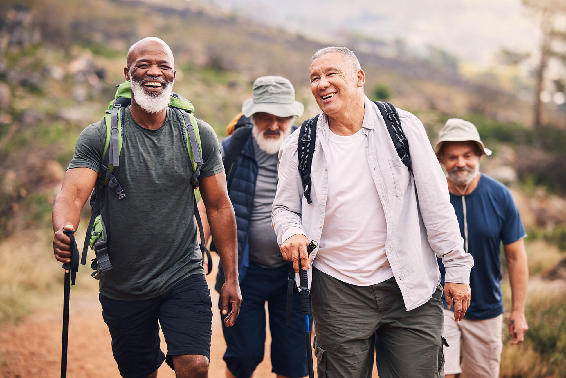 Hiking, smile and group of old men on mountain